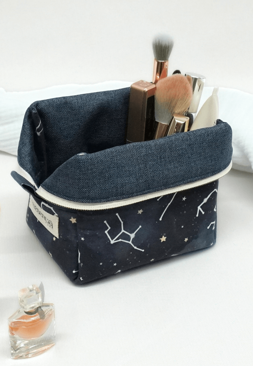 neceser pequeño de maquillaje azul marino