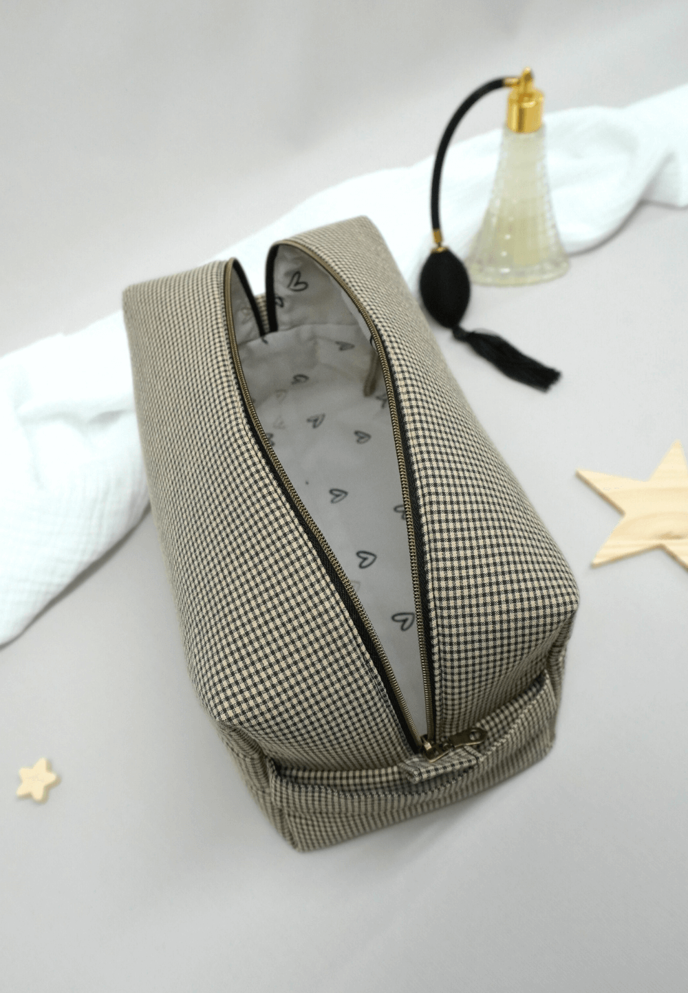 neceser viaje mujer grande beige y negro elegante