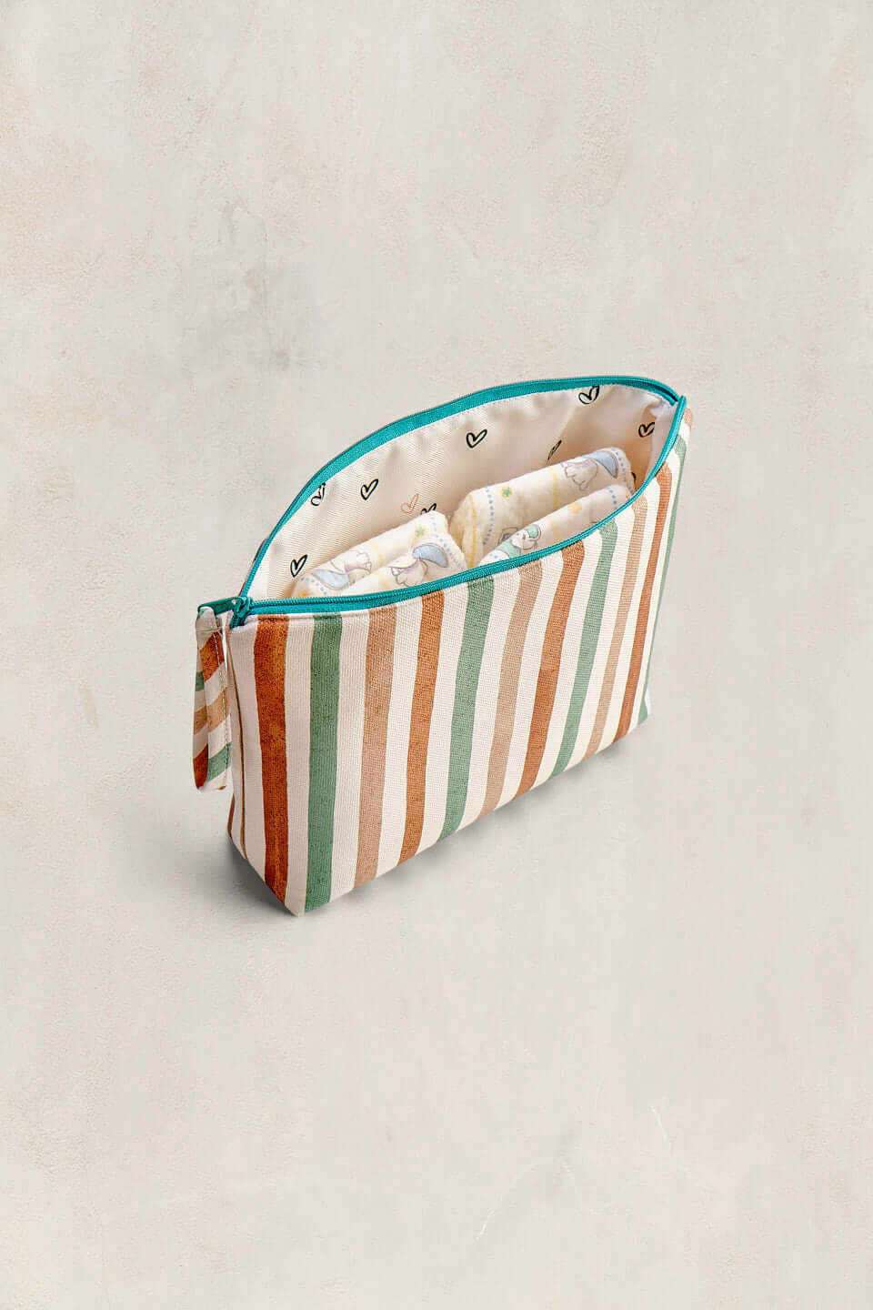 Pañalera Riviera Stripe – Compacta, impermeable y a juego