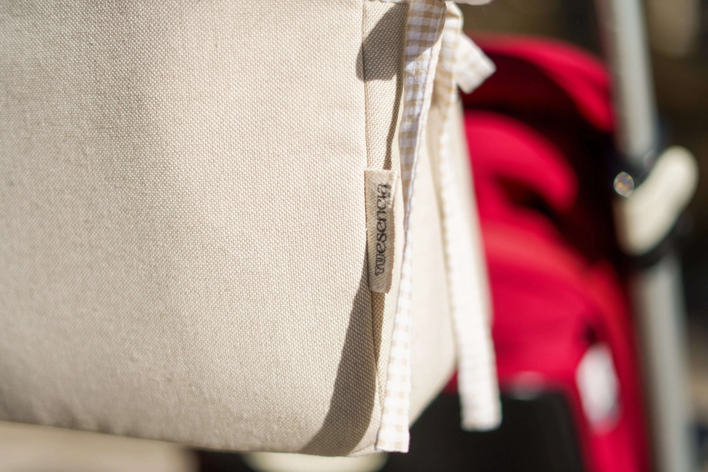 Bolso para silla ligera de bebé en beige y lacitos