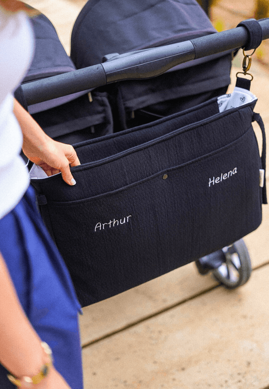 Bolso gemelar personalizado negro para carrito doble con nombres de los bebés mellizos