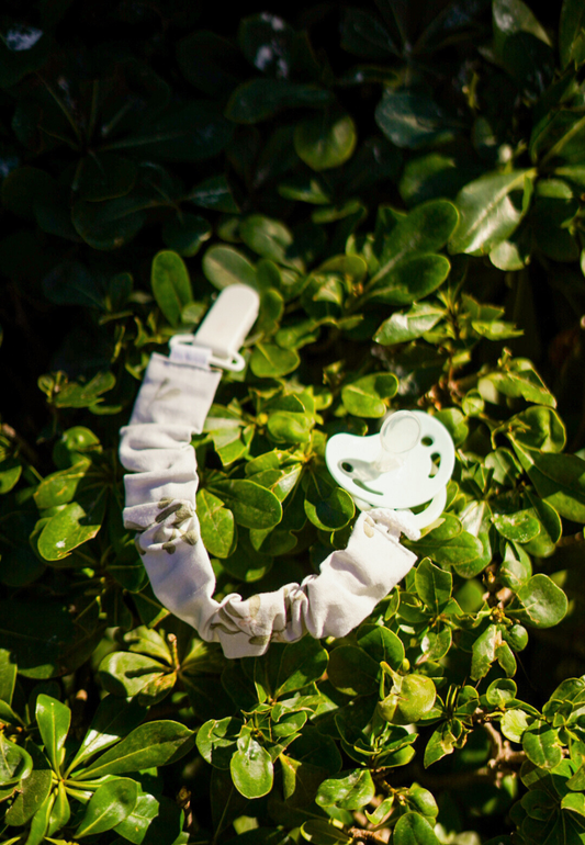 Chupetero rizado Olive Bloom · Algodón orgánico